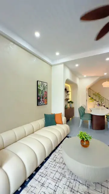 Nhà phố ban công bo cong cam đất — 2